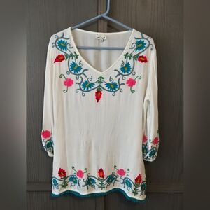 Embroidered White Top with Floral Accents